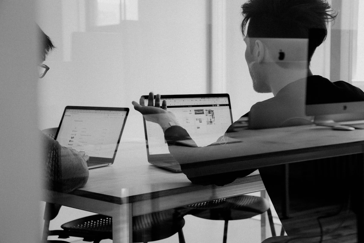 Individual professional working focused on a laptop